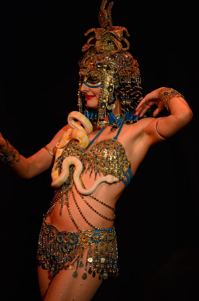 Egyptian Goddess Isis Serpent Dance with her golden python " Golden Rubie's " and this is the baby snake